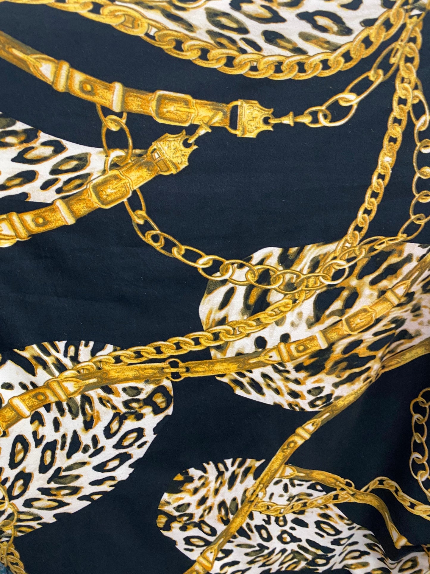 New Black and Gold print Chains all over on DTY brush 4-way stretch poly spandex fabric 58/60” Sold by the YD. Ships Los Ángeles CA.