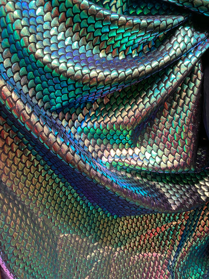 New iridescent green small mermaid design metallic hologram spandex 4-way stretch 58/60” Sold by the YD. Ships worldwide from Los Angeles CA