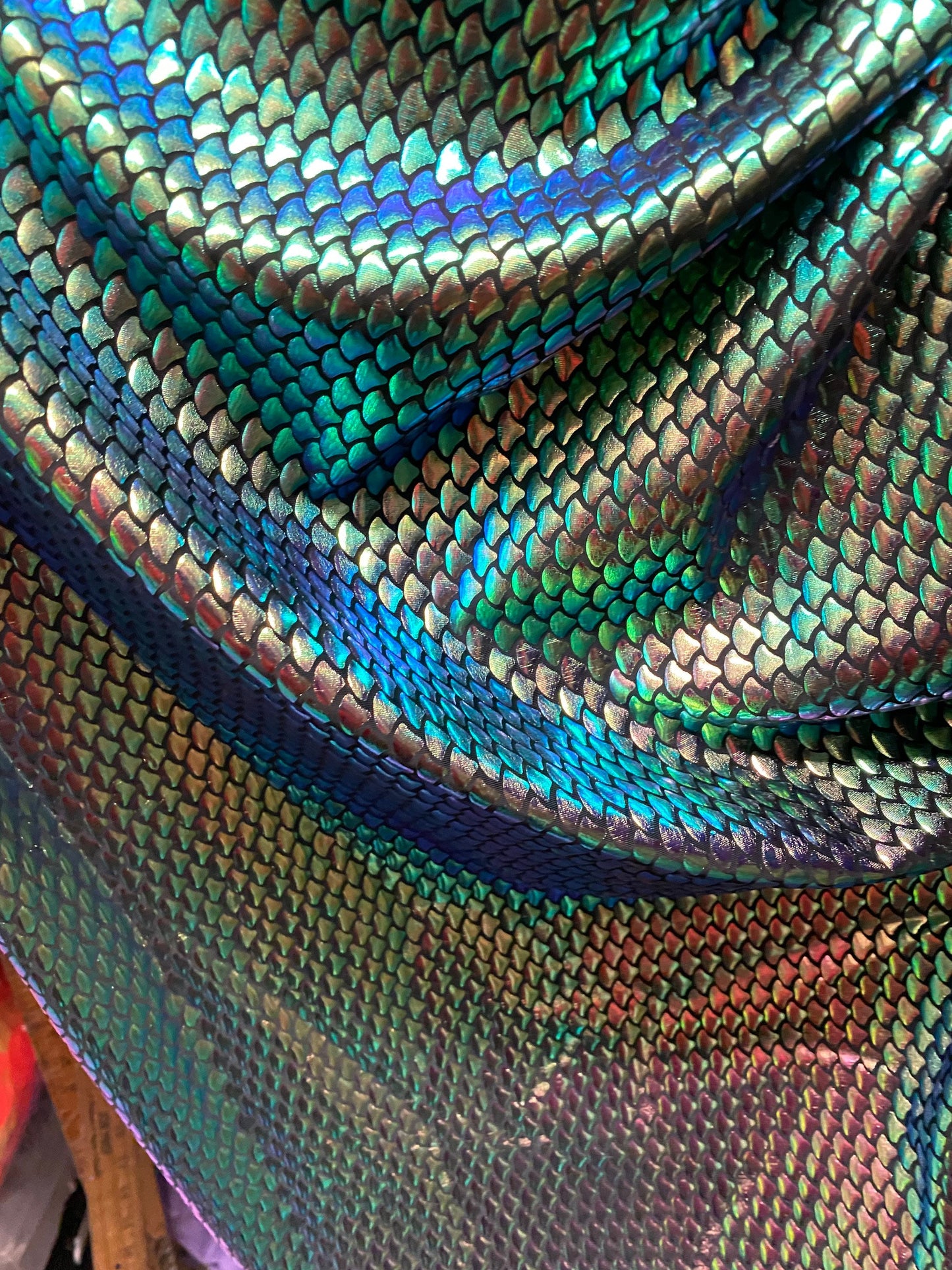 New iridescent green small mermaid design metallic hologram spandex 4-way stretch 58/60” Sold by the YD. Ships worldwide from Los Angeles CA