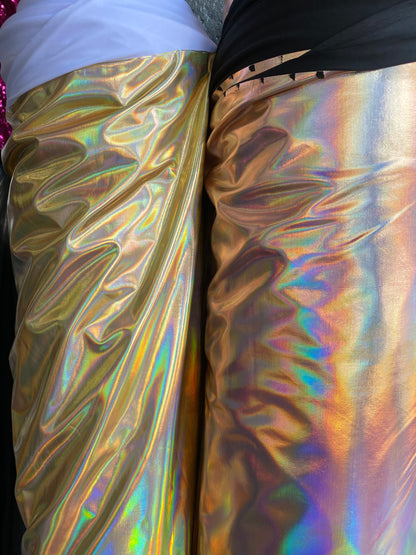 Luxury Iridescent all over foil metallic nylon spandex 4-way stretch 58/60” Sold by the YD. Ships worldwide from Los Angeles California USA.