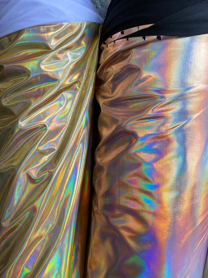 Luxury Iridescent all over foil metallic nylon spandex 4-way stretch 58/60” Sold by the YD. Ships worldwide from Los Angeles California USA.