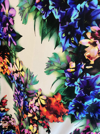 New poly spandex flower print medium weight 2-way stretch 58/60” Sold by the YD. Ships worldwide from Los Angeles California USA.