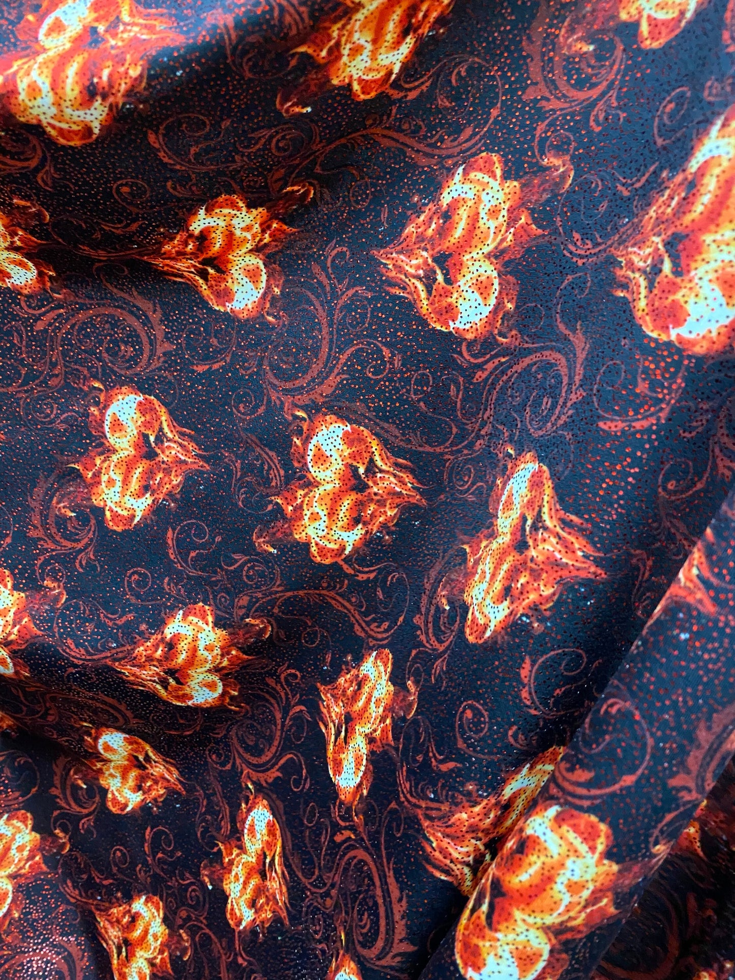 Fire Hot Desire design print nylon spandex with  metallic foil all over 4-way stretch 58/60” Sold by the YD. Ships worldwide from L.A CA USA