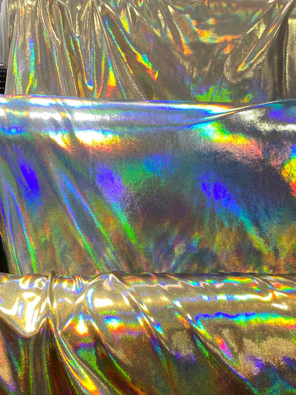 New Iridescent metallic foil on poly spandex medium weight 2-way stretch 58/60” Sold by the YD. Ships worldwide from Los Angeles California.