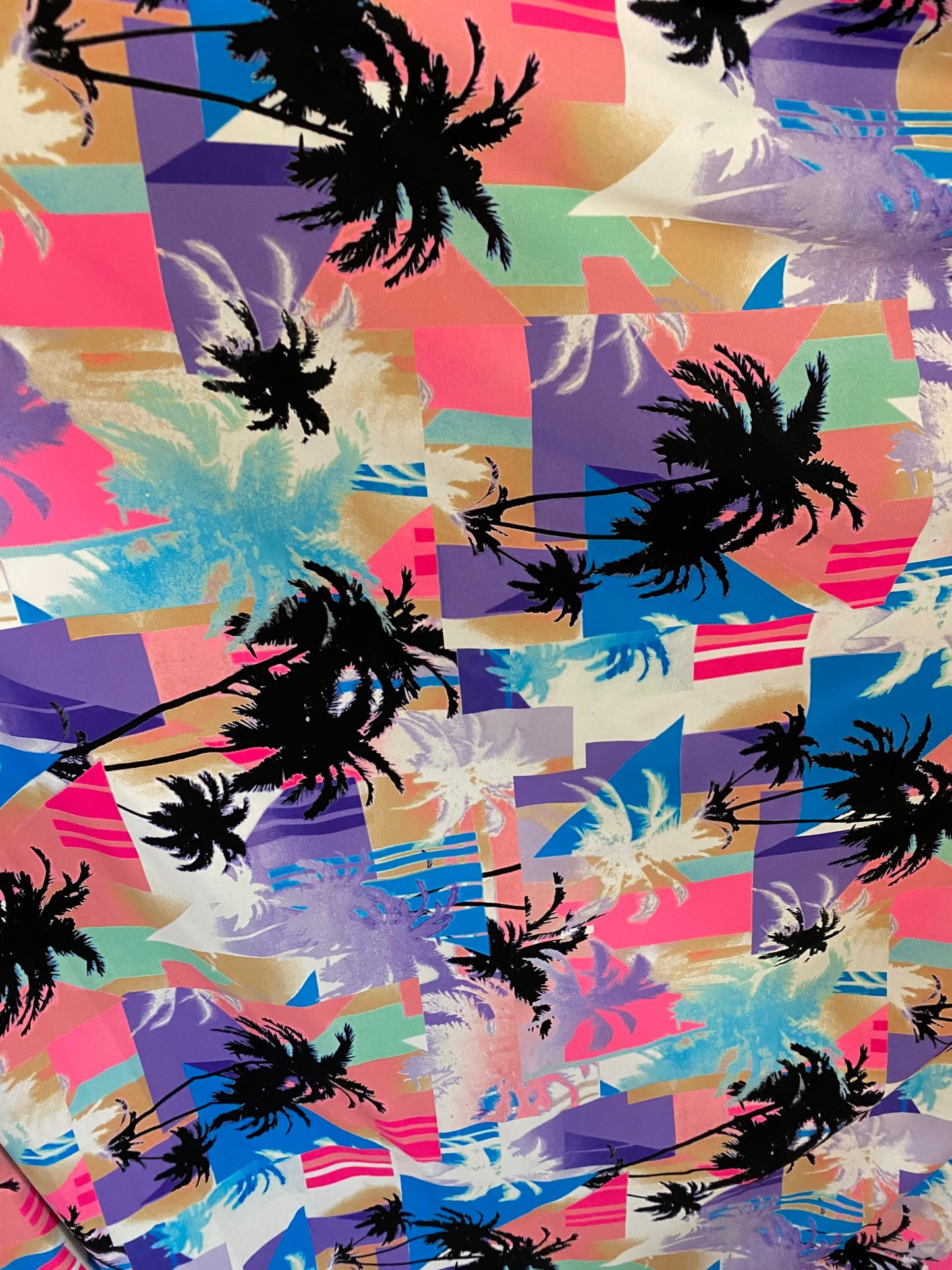 New palms trees design print on nylon spandex 4-way stretch 58/60” Sold by the YD. Ships worldwide from Los Angeles California USA.