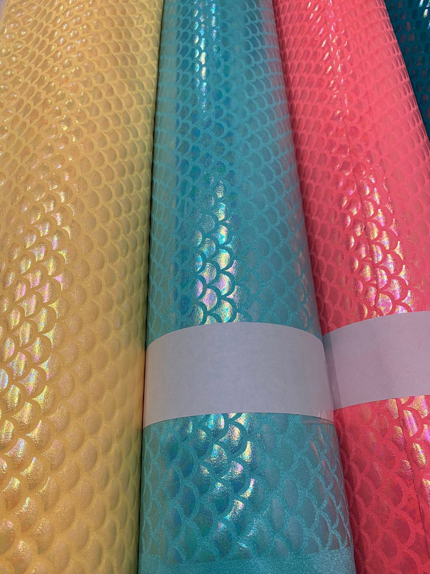 New Ilusión mermaid design crystal foil on nylon spandex 4-way stretch 58/60” Sold by the YD. Ships worldwide from Los Angeles California US