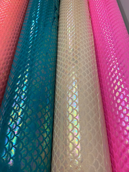 New Ilusión mermaid design crystal foil on nylon spandex 4-way stretch 58/60” Sold by the YD. Ships worldwide from Los Angeles California US