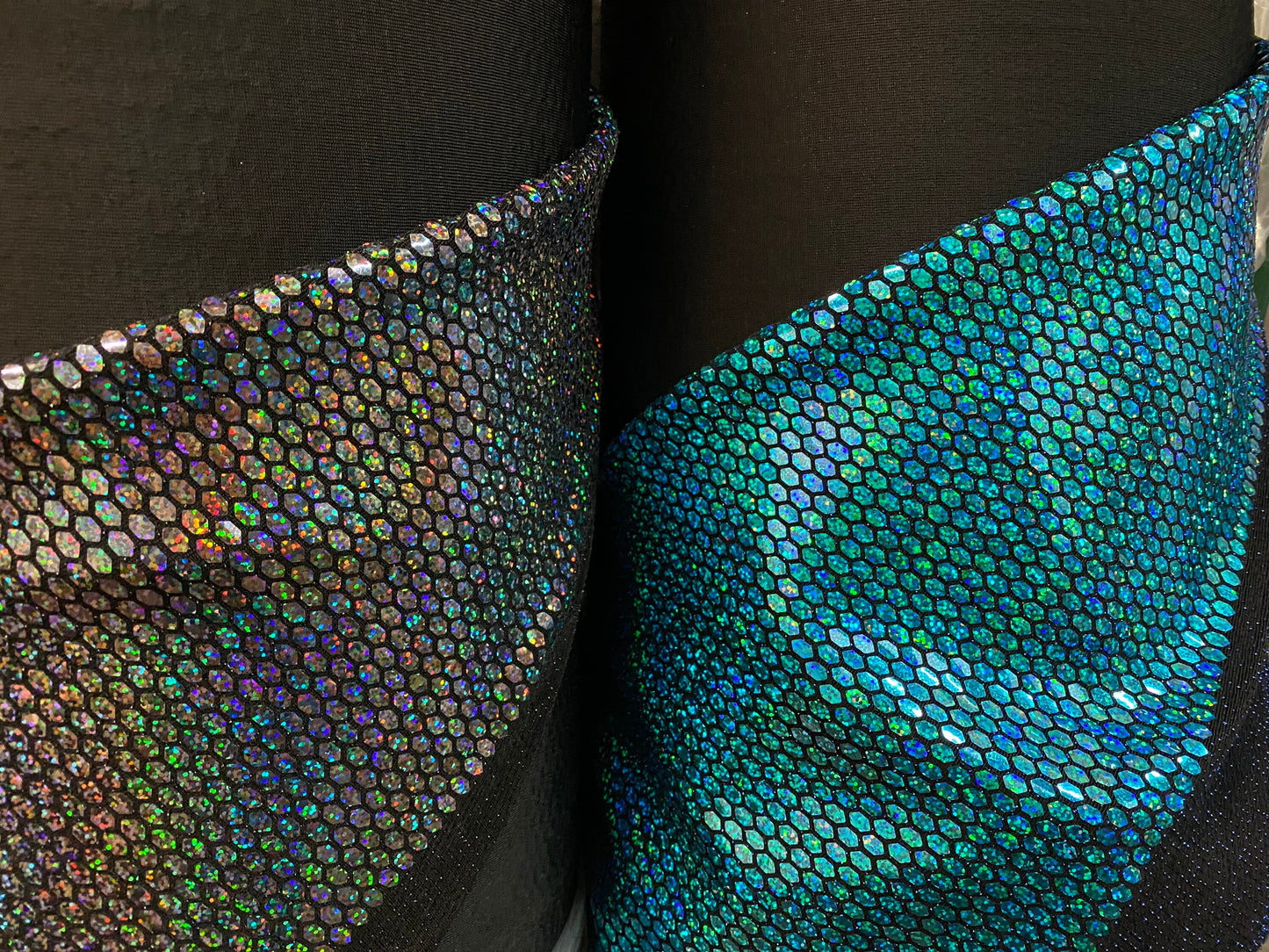 New geometric honeycomb design with flat mirror iridescent sequins all over nylon spandex 2-way stretch 58/60” Sold by the YD.