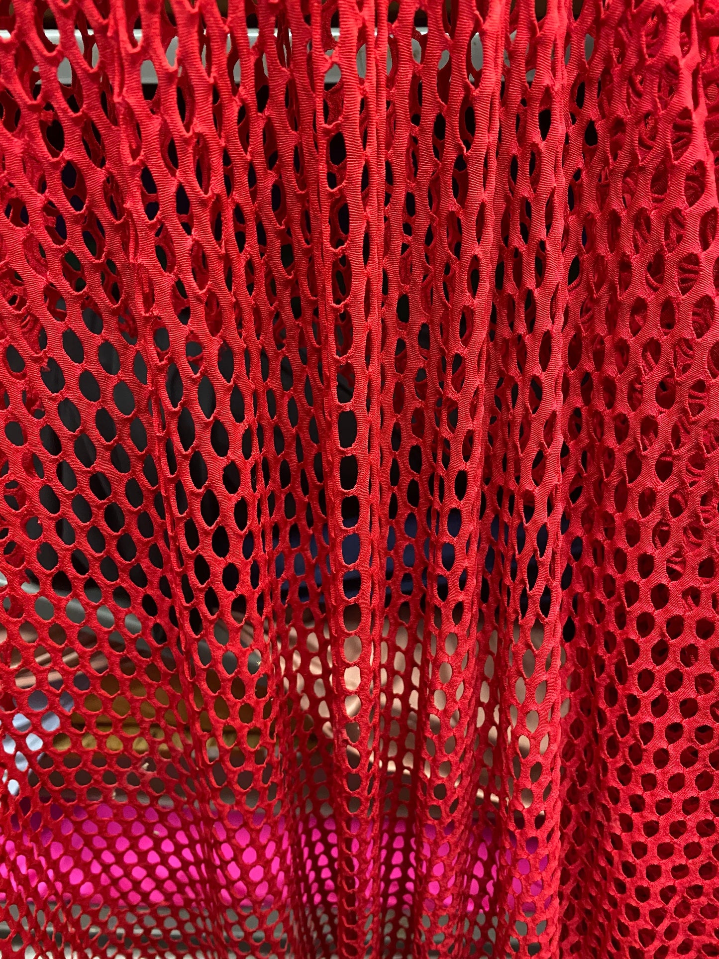 New Red fishnet medium size nylon spandex mesh 4-way 58/60” Sold by the YD. Ships worldwide from Los Angeles California USA.