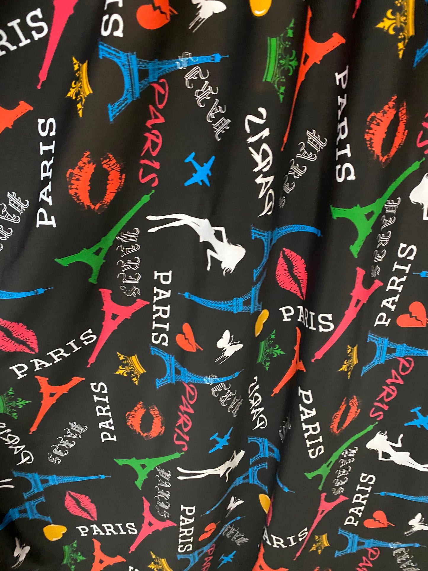 New Poly print spandex Paris design Black/Multicolor 2-way stretch 58/60” Sold by the YD. Ships worldwide from Los Angeles California USA.