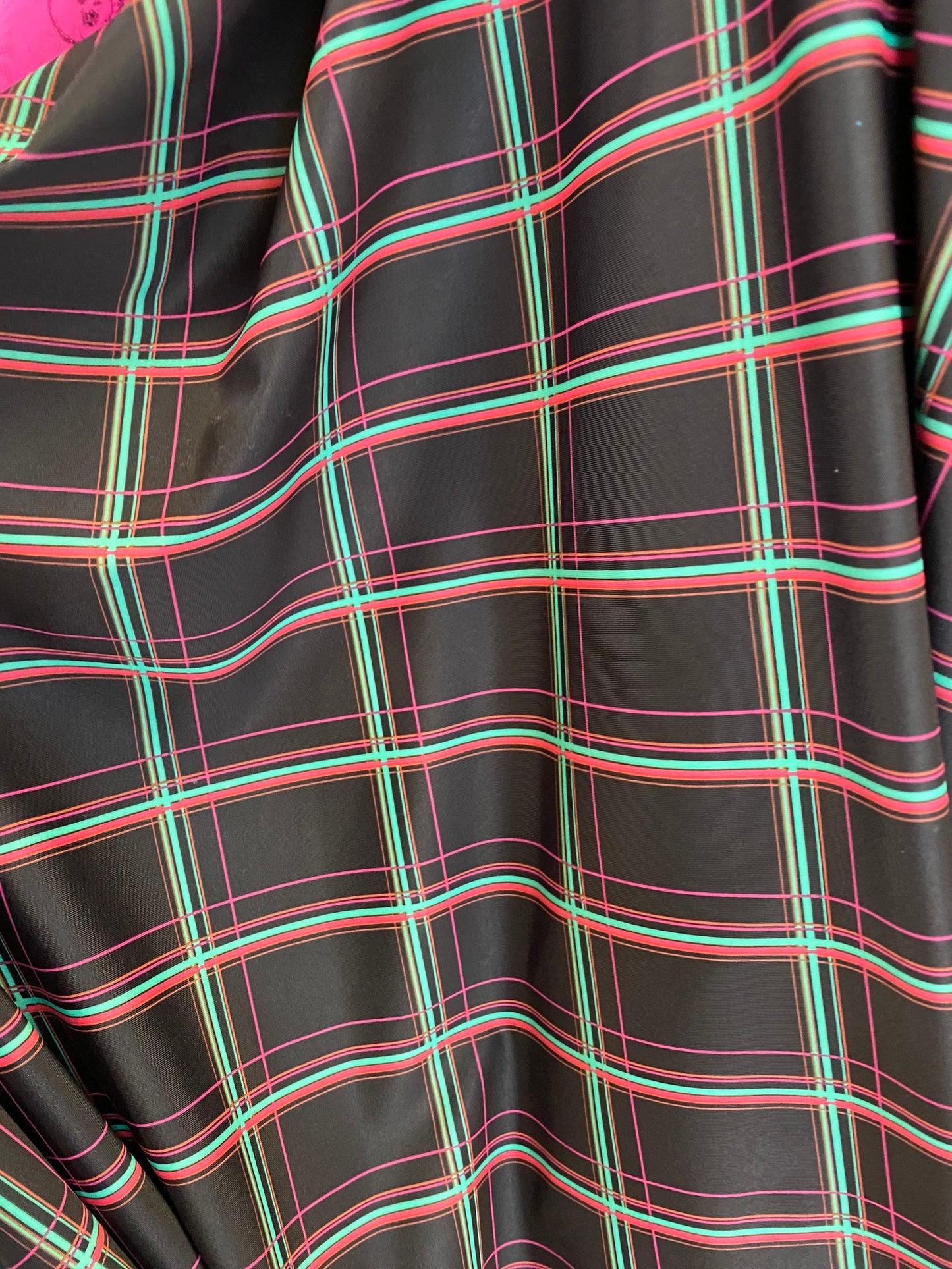 New plaid design black/multi print nylon spandex 4-way stretch 58/60” Sold by the YD. Ships worldwide from Los Angeles California USA.