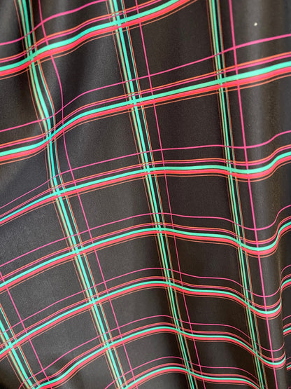 New plaid design black/multi print nylon spandex 4-way stretch 58/60” Sold by the YD. Ships worldwide from Los Angeles California USA.