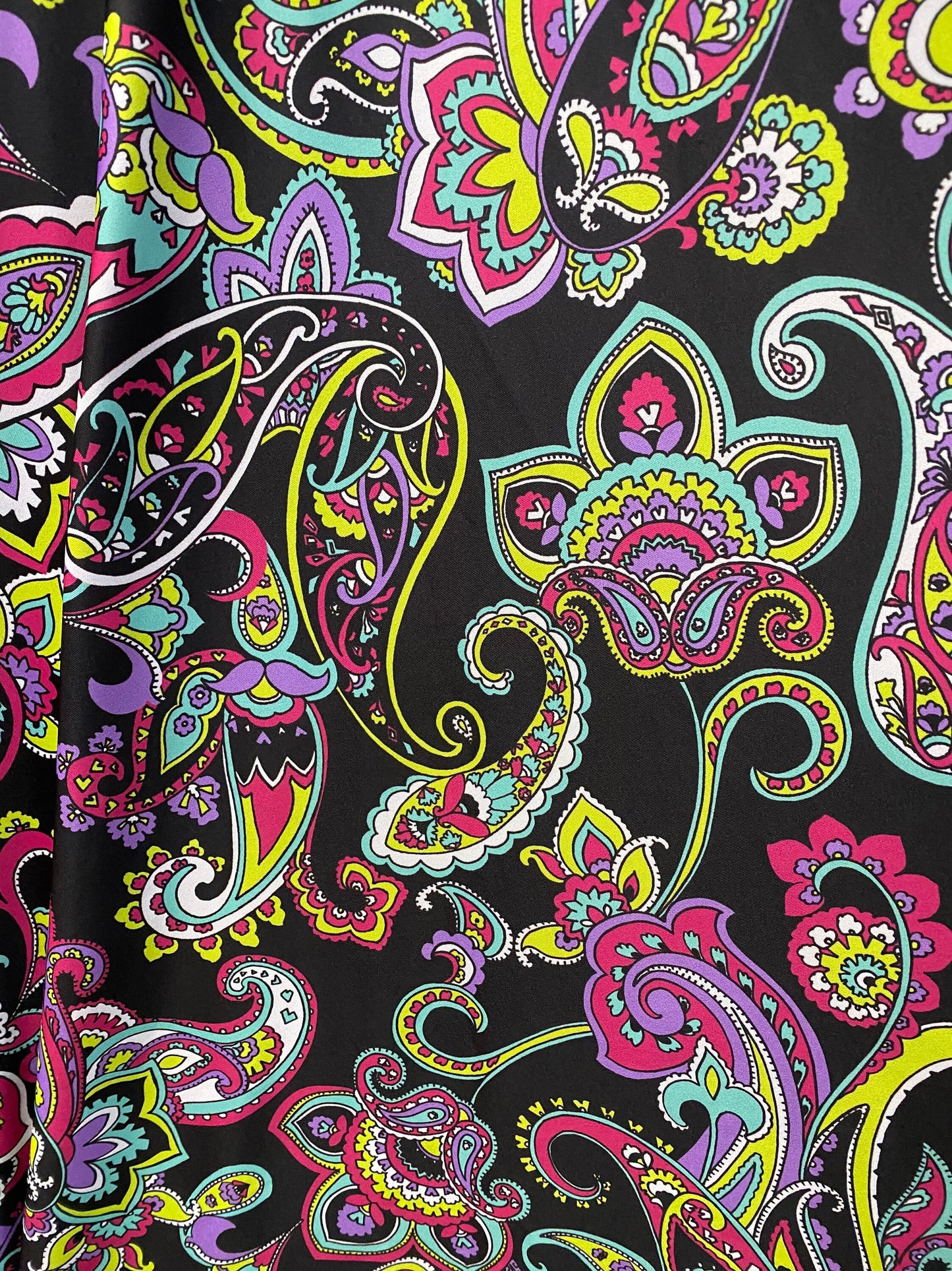 New paisley design print on poly spandex 4-way stretch 58/60” Sold by the YD. Ships worldwide from Los Angeles California USA.