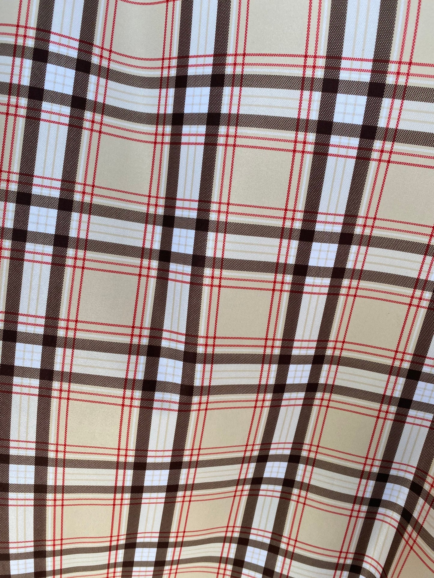 Luxury Brand Taupe plaid design print on poly spandex 4way stretch 58/60” Sold by the YD. Ships worldwide from Los Angeles California USA