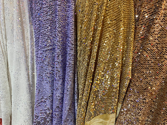 New stretch velvet with hanging sequins all over 2-way stretch 58/60” Sold by the YD. Ships worldwide from Los Angeles California USA.