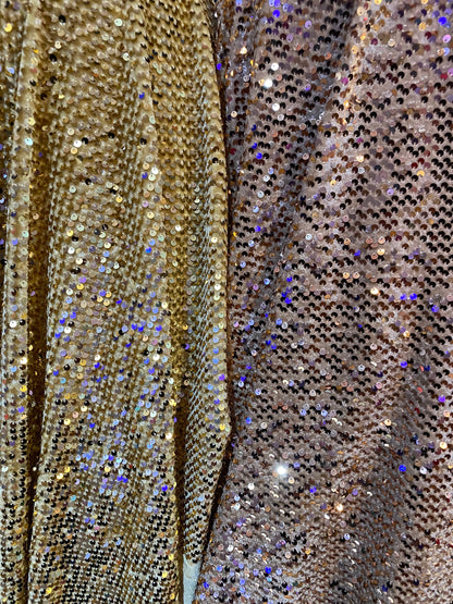 New stretch velvet with hanging sequins all over 2-way stretch 58/60” Sold by the YD. Ships worldwide from Los Angeles California USA.