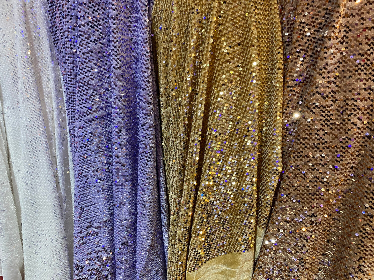 New stretch velvet with hanging sequins all over 2-way stretch 58/60” Sold by the YD. Ships worldwide from Los Angeles California USA.