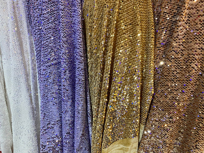 New stretch velvet with hanging sequins all over 2-way stretch 58/60” Sold by the YD. Ships worldwide from Los Angeles California USA.