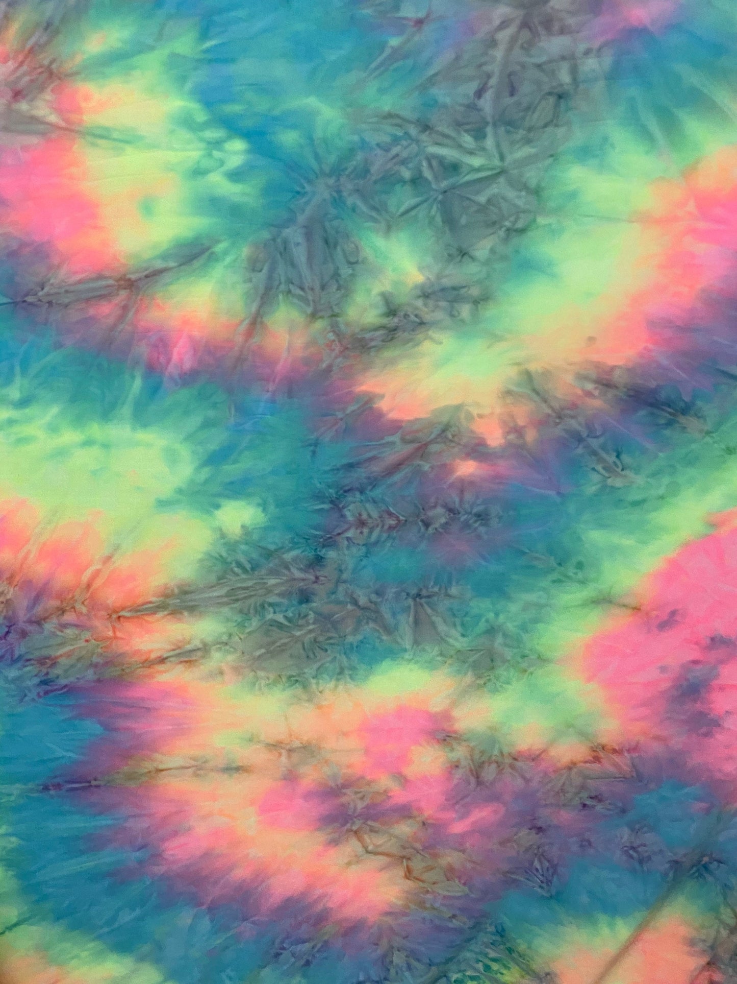 New tie dye poly spandex pastel colors 2-way stretch medium weight 58/60” Sold by the YD. Ships worldwide from Los Angeles California USA.