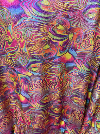 New abstract lava design with foil multicolor print on nylon spandex 4way stretch 58/60” Sold by the YD. Ships worldwide from Los Angeles CA