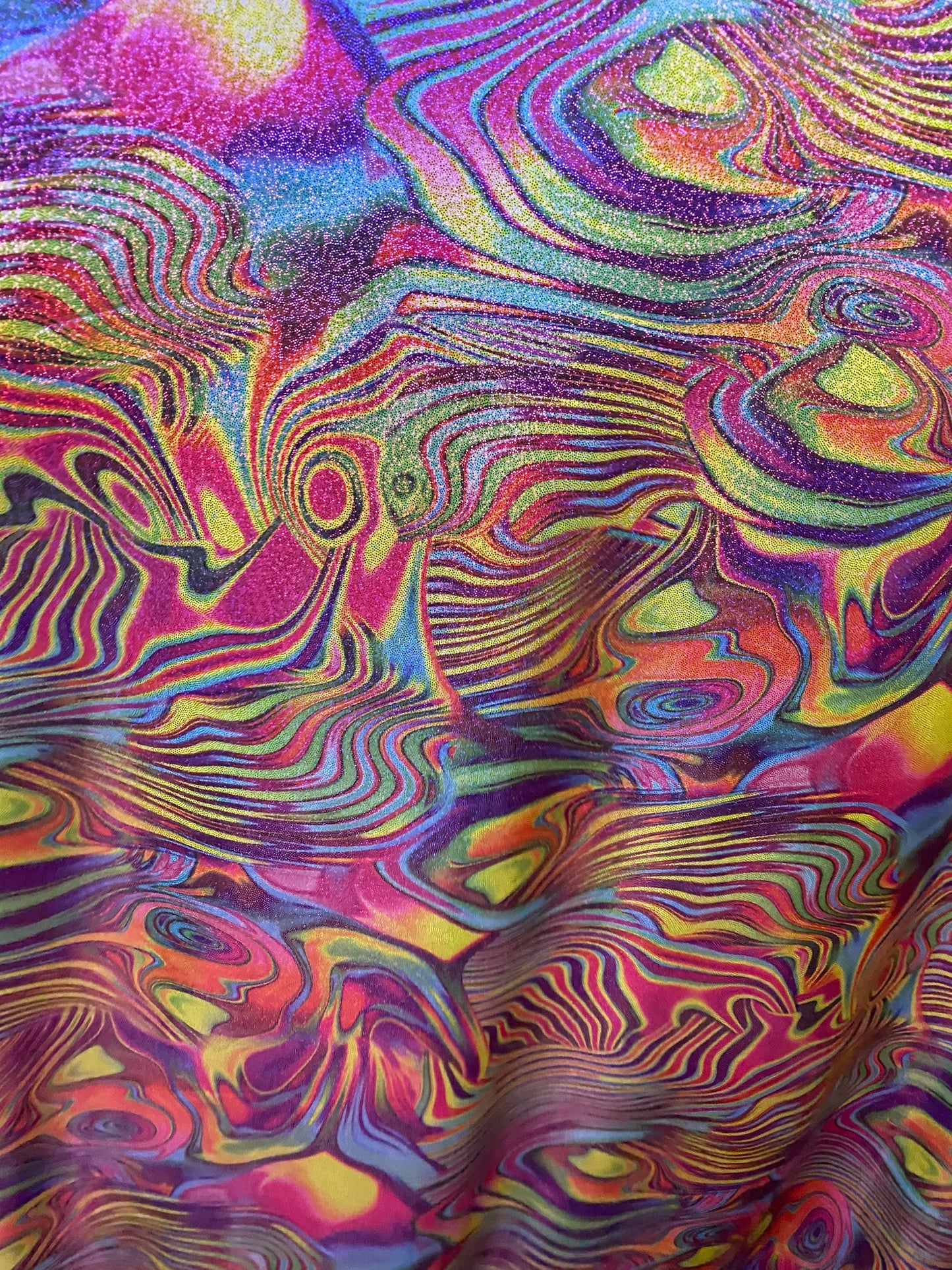 New abstract lava design with foil multicolor print on nylon spandex 4way stretch 58/60” Sold by the YD. Ships worldwide from Los Angeles CA