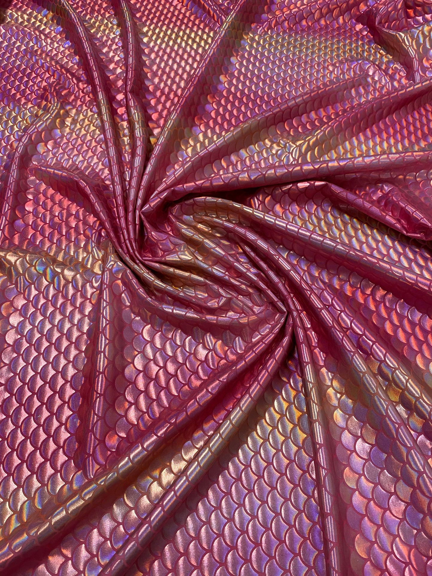 New Rainbow mermaid design pink/coral iridescent metallic nylon spandex 4-way stretch 58/60” Sold by the YD. Ships worldwide from L.A CA.