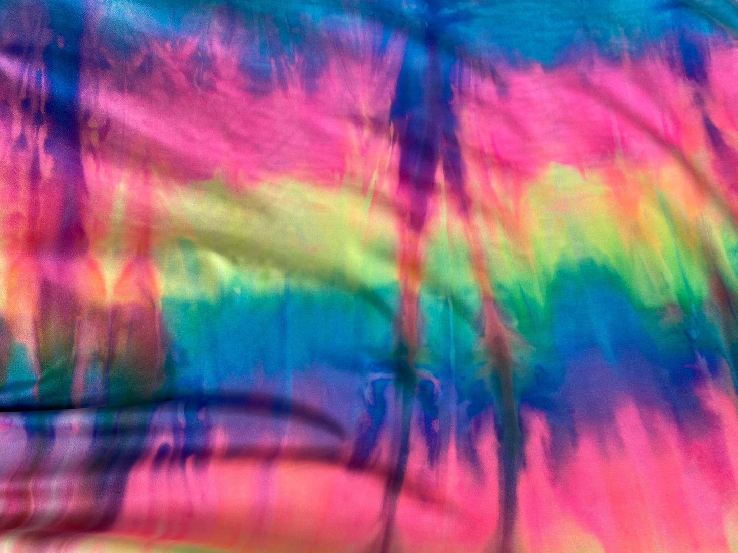 New print nylon spandex tie dye design bright colors 4-way Stretch 58-60” Sold by the YD. Ships worldwide from Los Ángeles California USA.