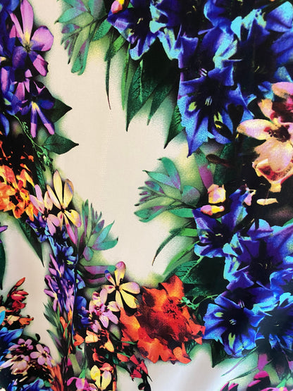 New poly spandex flower print medium weight 2-way stretch 58/60” Sold by the YD. Ships worldwide from Los Angeles California USA.