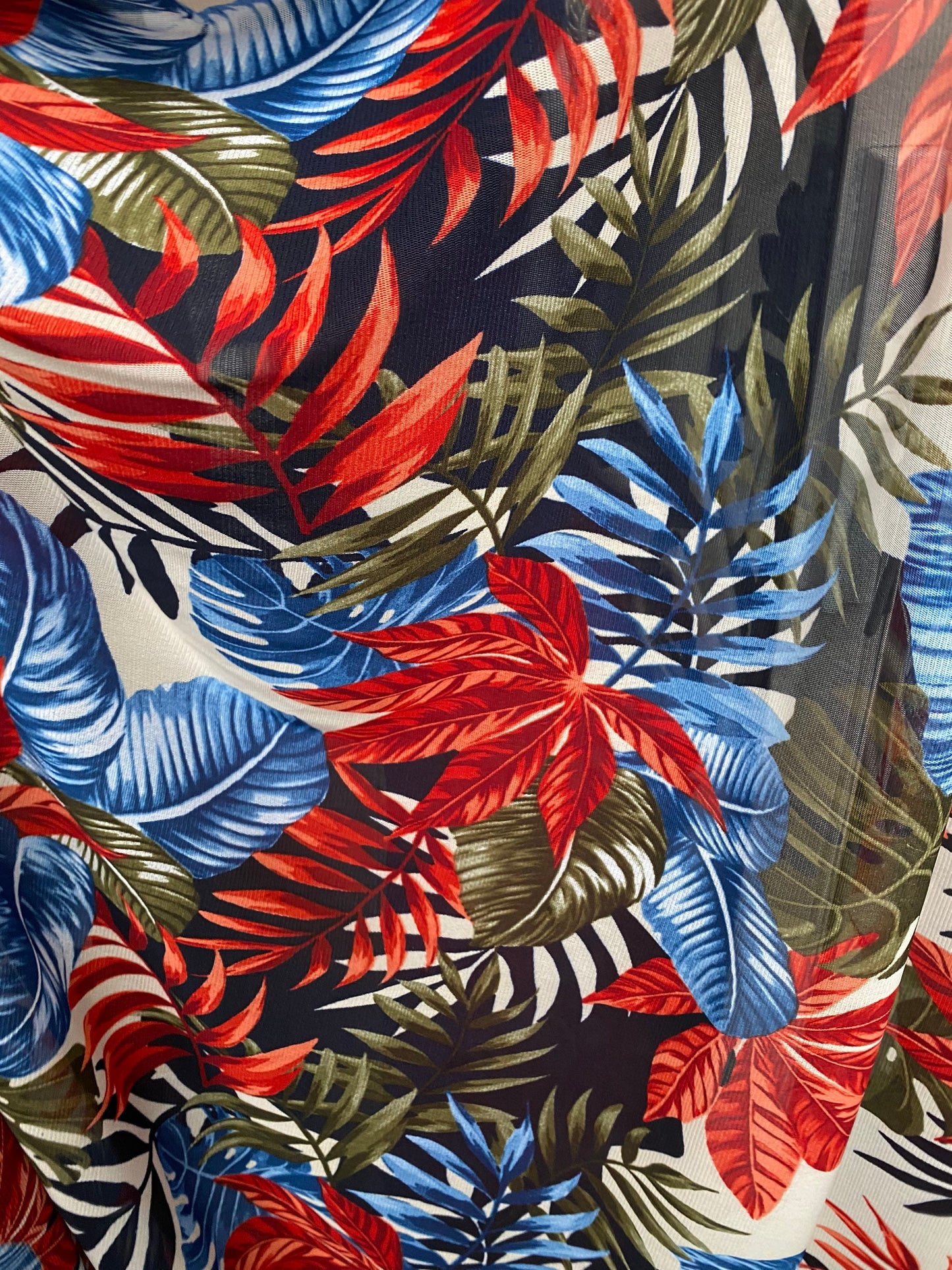 New tropical design print on best quality of power mesh 4way stretch 58/60” Sold by the YD. Ships worldwide from Los Angeles California USA.