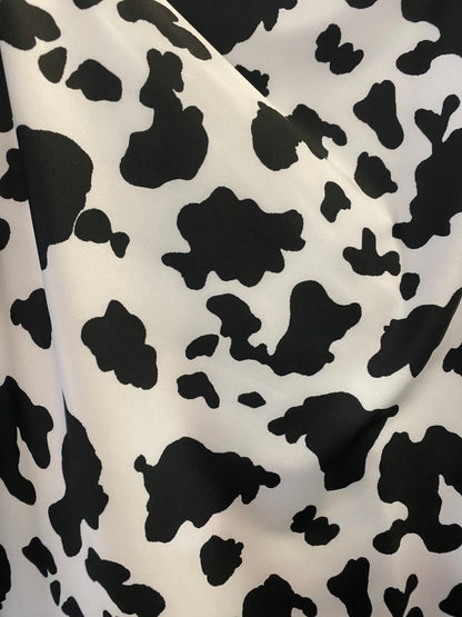 Cow design print on poly spandex 4-way stretch medium weight 58/60” Sold by the YD. Ships worldwide from Los Angeles California USA.