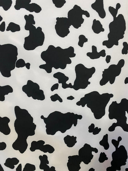 Cow design print on poly spandex 4-way stretch medium weight 58/60” Sold by the YD. Ships worldwide from Los Angeles California USA.