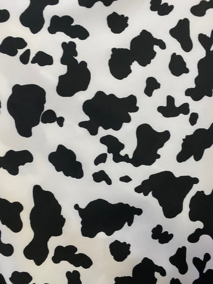 Cow design print on poly spandex 4-way stretch medium weight 58/60” Sold by the YD. Ships worldwide from Los Angeles California USA.