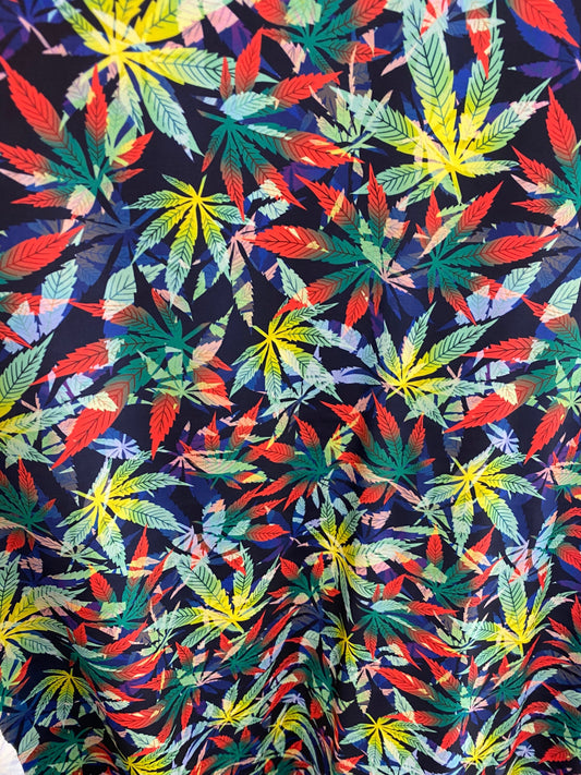 Marijuana cannabis leaf design print on nylon spandex 4way stretch 58/60” Sold by the YD. Ships worldwide from Los Angeles California USA.