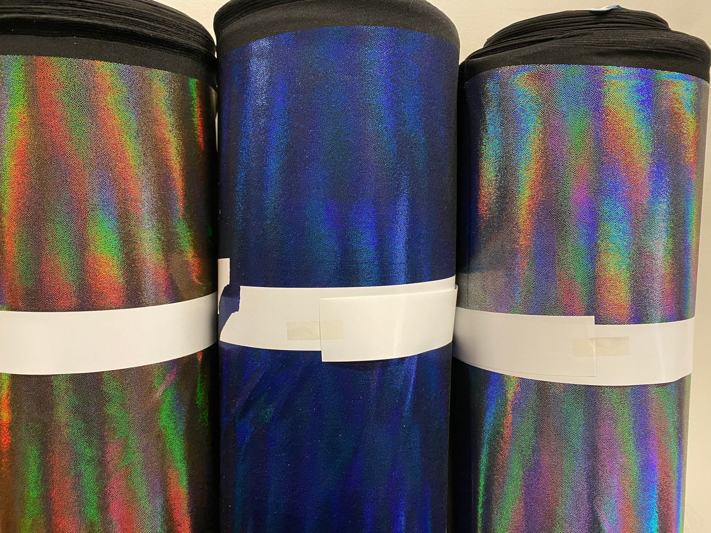 Oil slick hologram nylon spandex iridescent all over foil 4-way stretch 58/60” Sold by the YD. Ships worldwide from Los Angeles CA