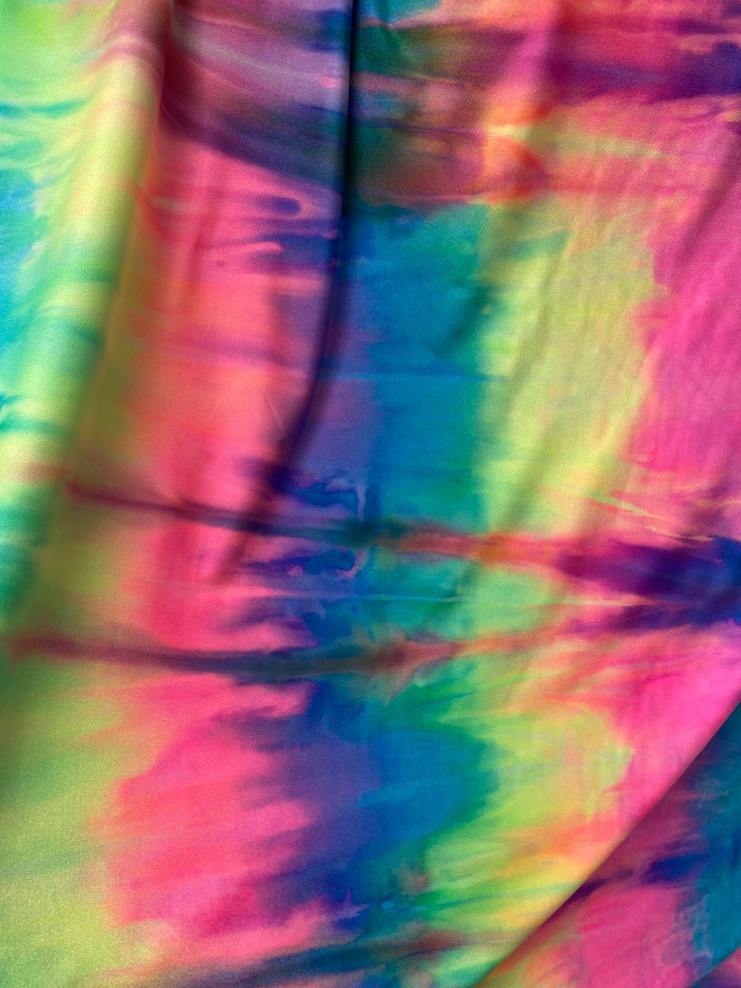 New print nylon spandex tie dye design bright colors 4-way Stretch 58-60” Sold by the YD. Ships worldwide from Los Ángeles California USA.