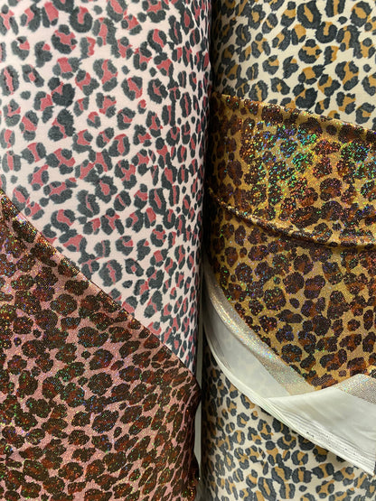 New Exotic cheetah design hologram nylon spandex 4-way spandex 58/60” Sold by the YD. Ships worldwide from Los Angeles California USA.