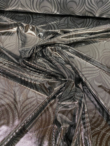 Peacock feathers design hologram metallic nylon spandex 4-way Stretch 58/60” Sold by the YD. Ships worldwide from Los Angeles California USA