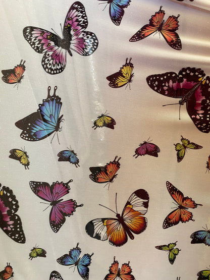 New butterflies design multicolor print on good quality stretch power mesh 4-way stretch 58/60” Sold by the YD. Ships worldwide from L.A CA.