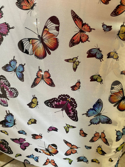 New butterflies design multicolor print on good quality stretch power mesh 4-way stretch 58/60” Sold by the YD. Ships worldwide from L.A CA.