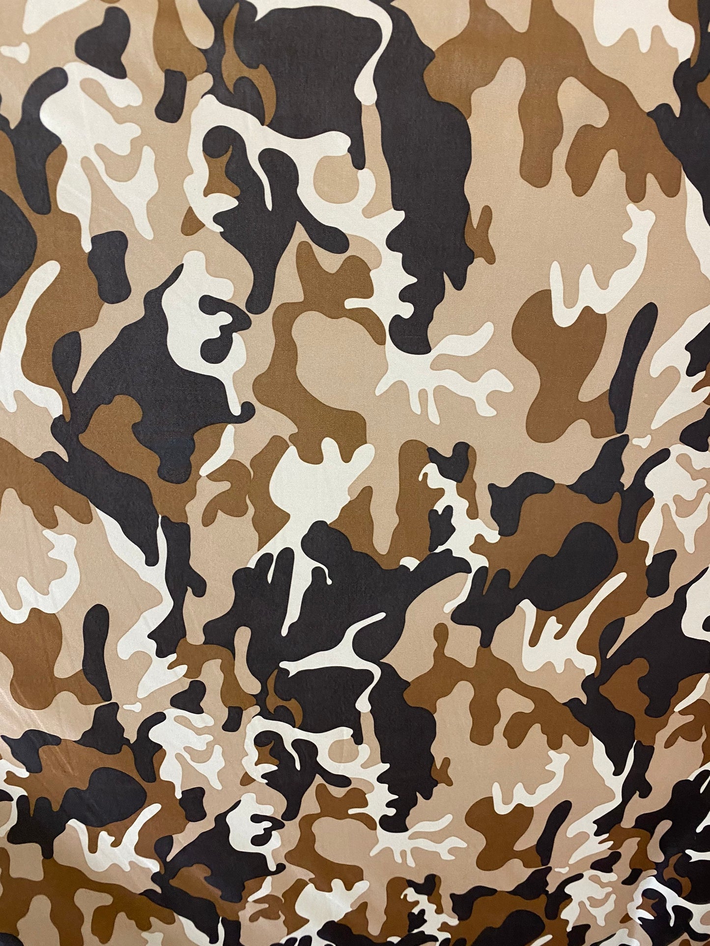 New camouflage design print on poly spandex 4-way stretch medium weight 58/60” Sold by the YD. Ships worldwide from Los Ángeles California.