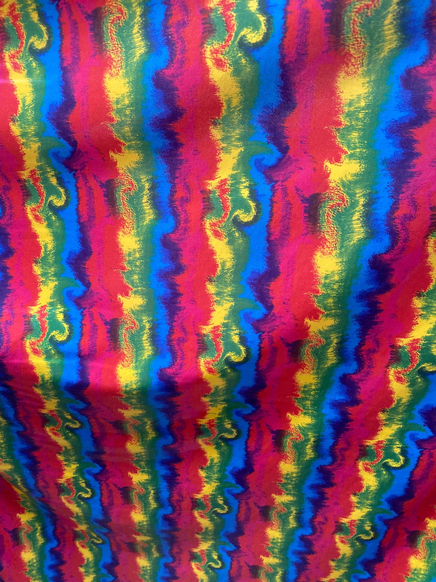 New Lava design rainbow color print nylon spandex with clear foggy foil all over 4-way stretch 58/60” Sold by the YD.