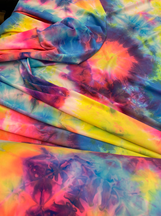 Great tie dye design best quality of nylon spandex 4-way stretch 58/60” Sold by the YD. Ships worldwide from Los Angeles California USA.