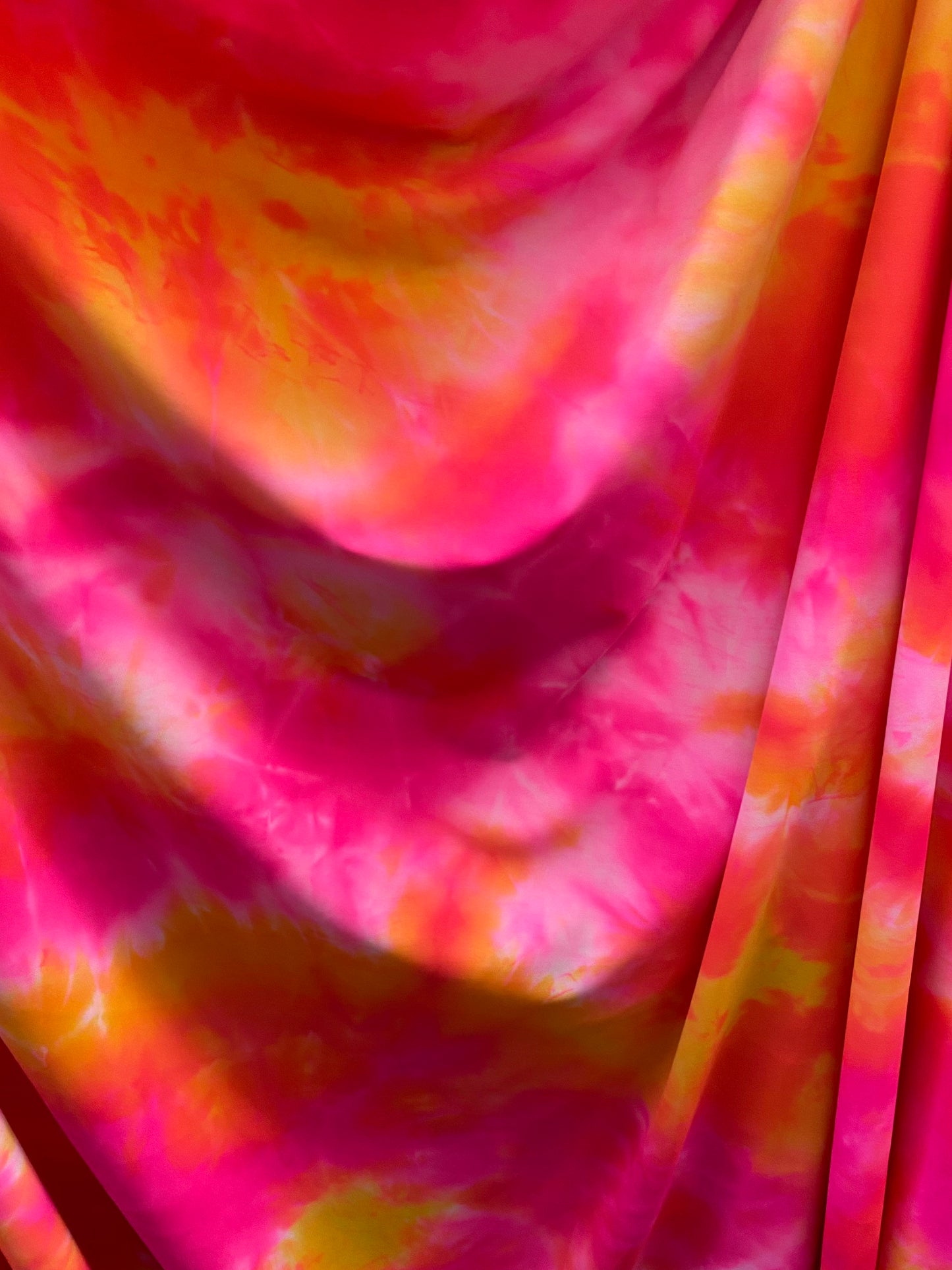 Great tie dye design best quality of nylon spandex 4-way stretch 58/60” Sold by the YD. Ships worldwide from Los Angeles California USA.