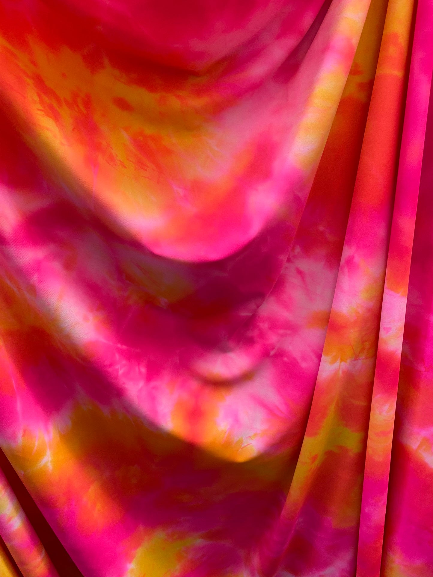 Great tie dye design best quality of nylon spandex 4-way stretch 58/60” Sold by the YD. Ships worldwide from Los Angeles California USA.