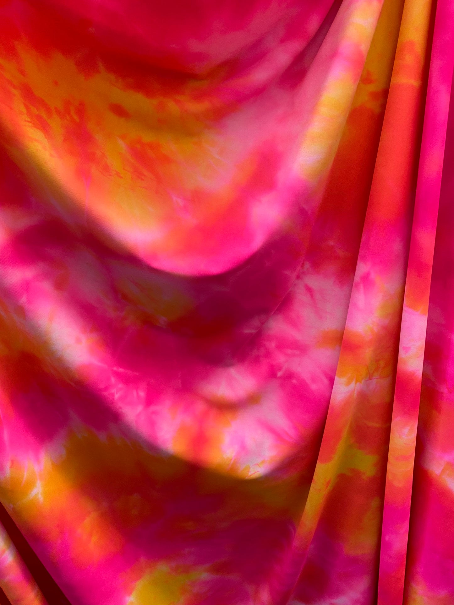 Great tie dye design best quality of nylon spandex 4-way stretch 58/60” Sold by the YD. Ships worldwide from Los Angeles California USA.