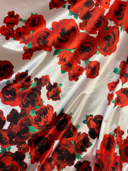 New poly shining spandex with red flower design 4-way stretch 58/60” Sold by the YD. Ships worldwide from Los Angeles California USA.