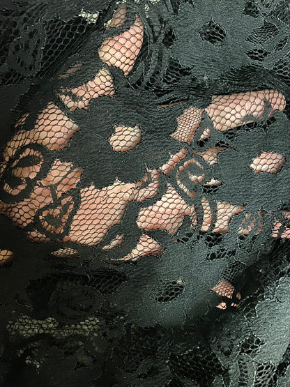 New embroidered black lace  flower design 2-way stretch 55/57” Sold by the YD. Ships worldwide from Los Angeles California USA.