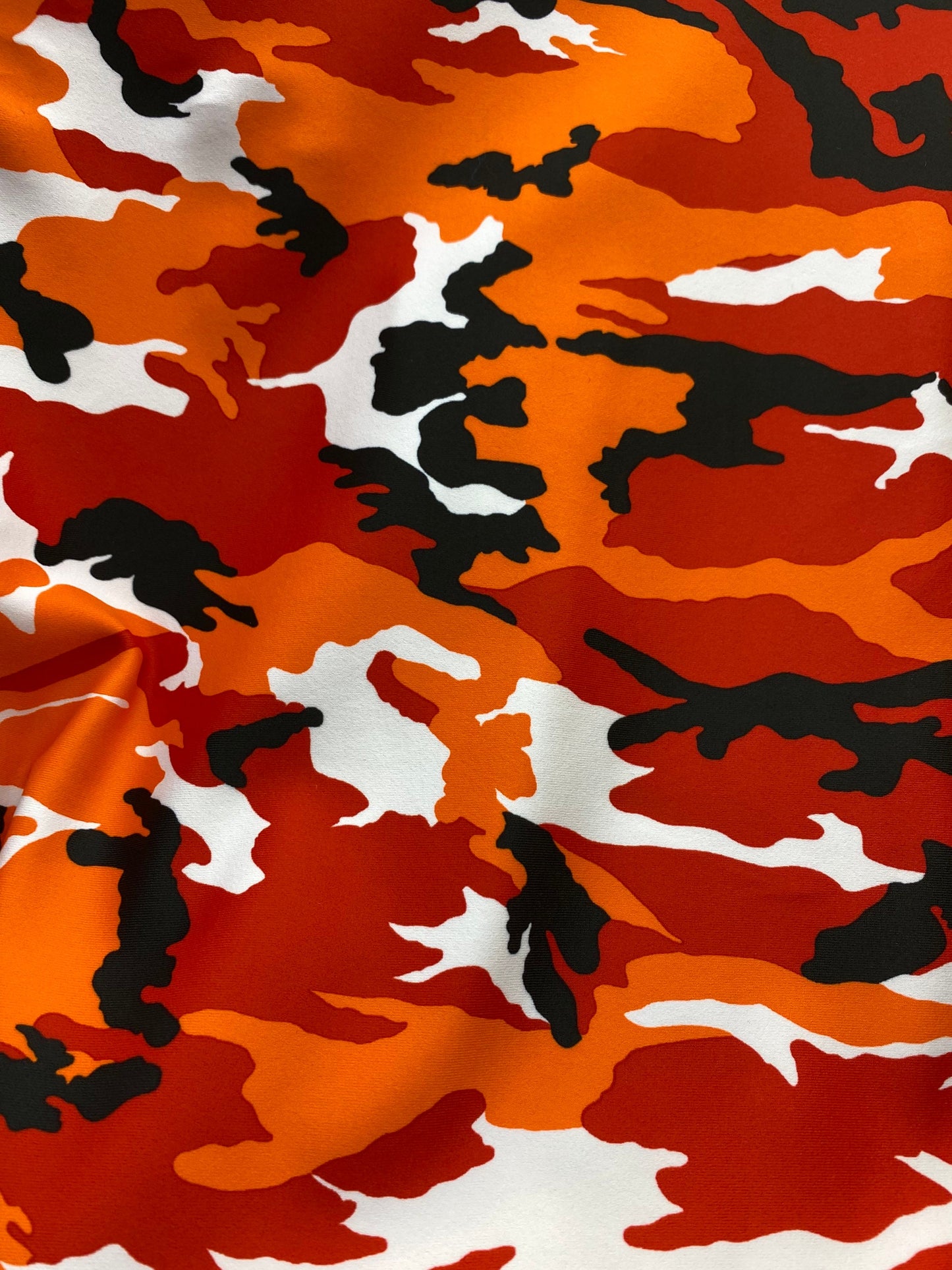 New camouflage print on nylon spandex 4-way stretch 58/60” Sold by the YD. Ships worldwide from Los Angeles California USA.