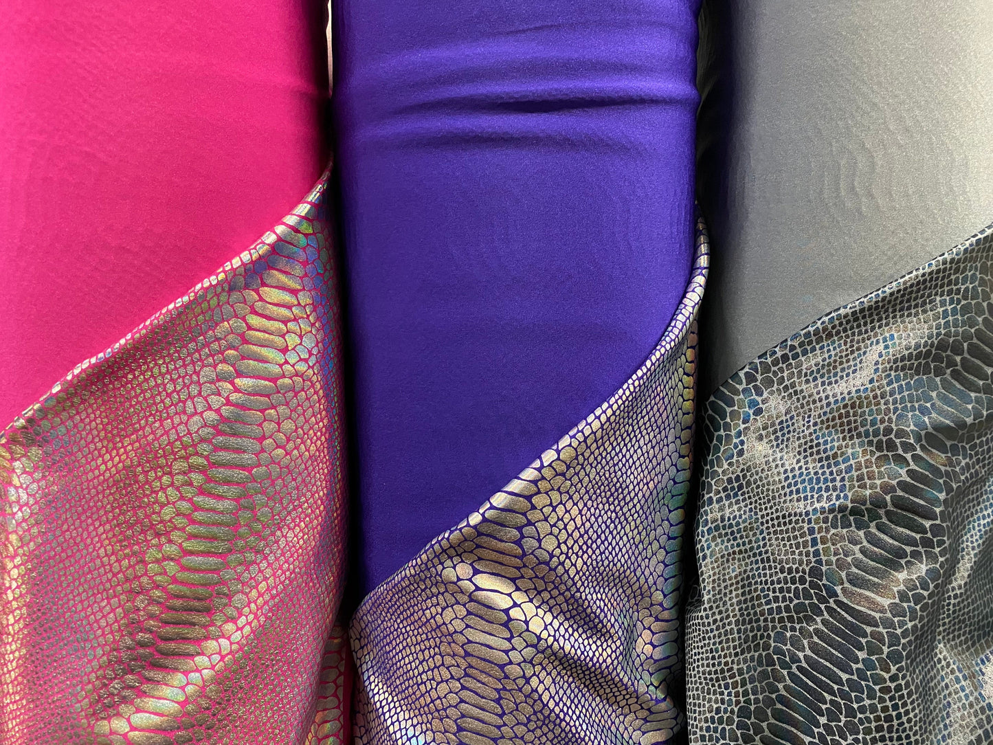 Ilusión Anaconda design crystal iridescent foil on nylon spandex 4-way stretch 58/60” Sold by the YD. Ships worldwide from Los Angeles CA.