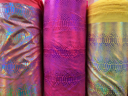 Ilusión Anaconda design crystal iridescent foil on nylon spandex 4-way stretch 58/60” Sold by the YD. Ships worldwide from Los Angeles CA.